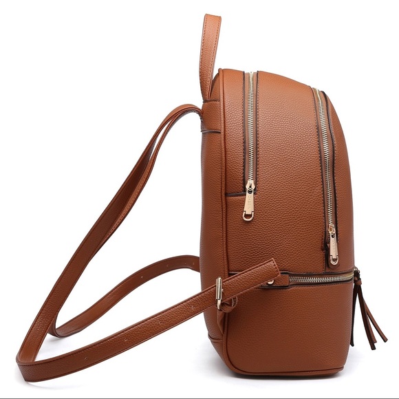 boutique Handbags - light tan faux leather backpack  **see pics